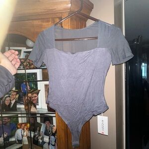 NEW NWT Kiczoy Medium Gray Bodysuit. SUPER COMFY.